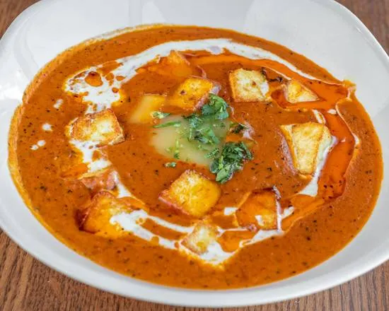 Butter Chicken - creamy curry at Curries and Puffs Edmonton