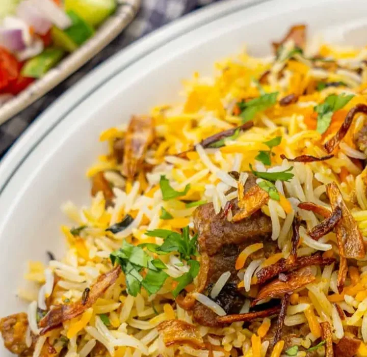 Chicken Biryani - aromatic rice at Curries & Puffs Mill Woods